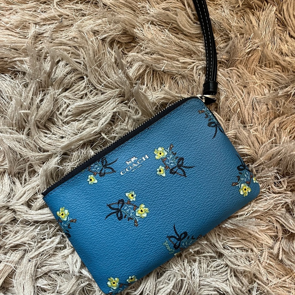 Coach Blue Wristlet with Floral Design